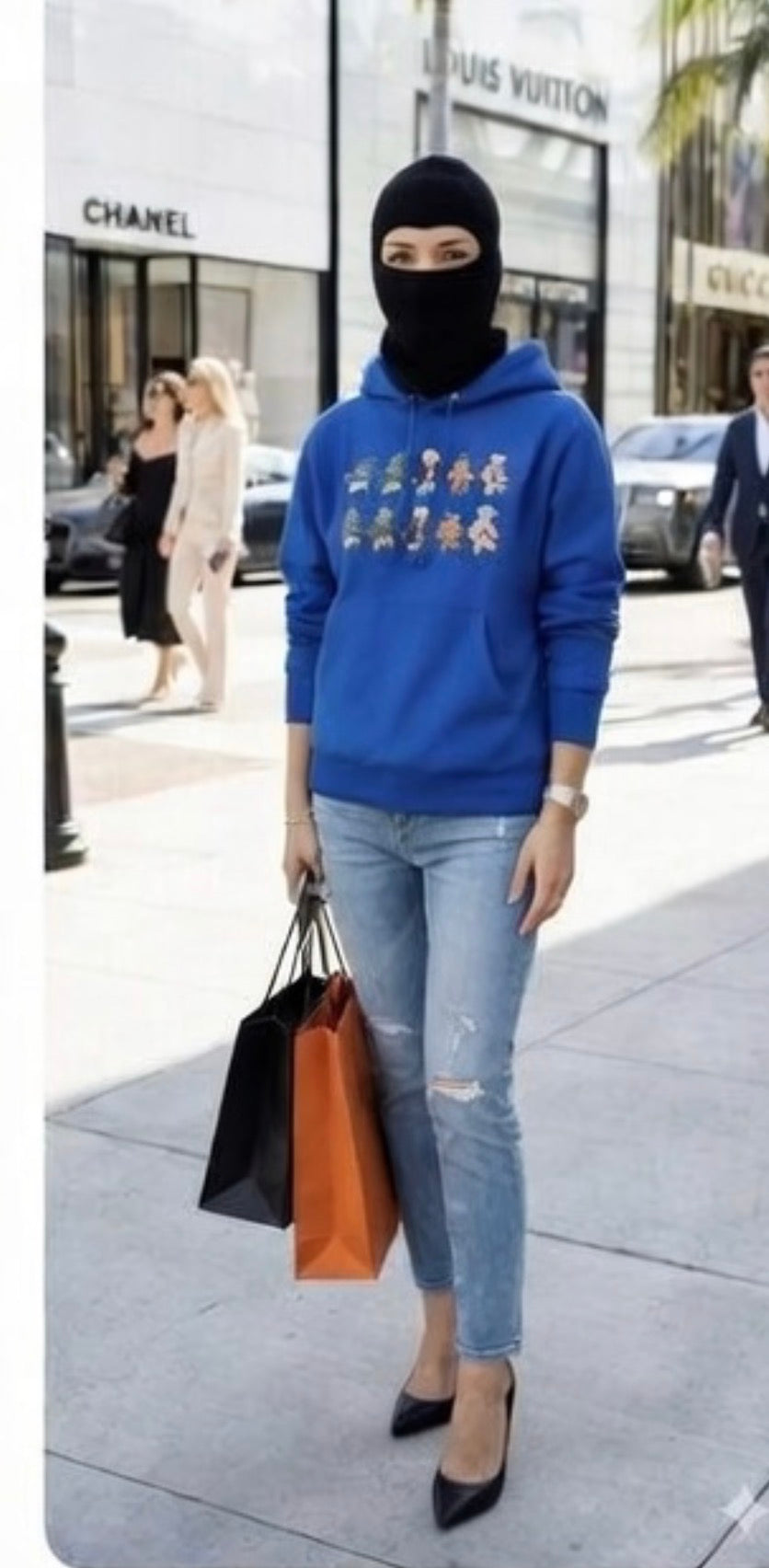 Royal blue hoodie with bear character graphic and kangaroo pocket