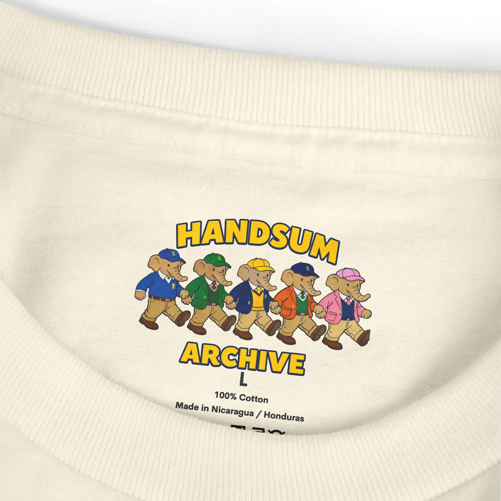 Cream T-shirt neckline close-up with “HANDSUN ARCHIVE L” and cotton text
