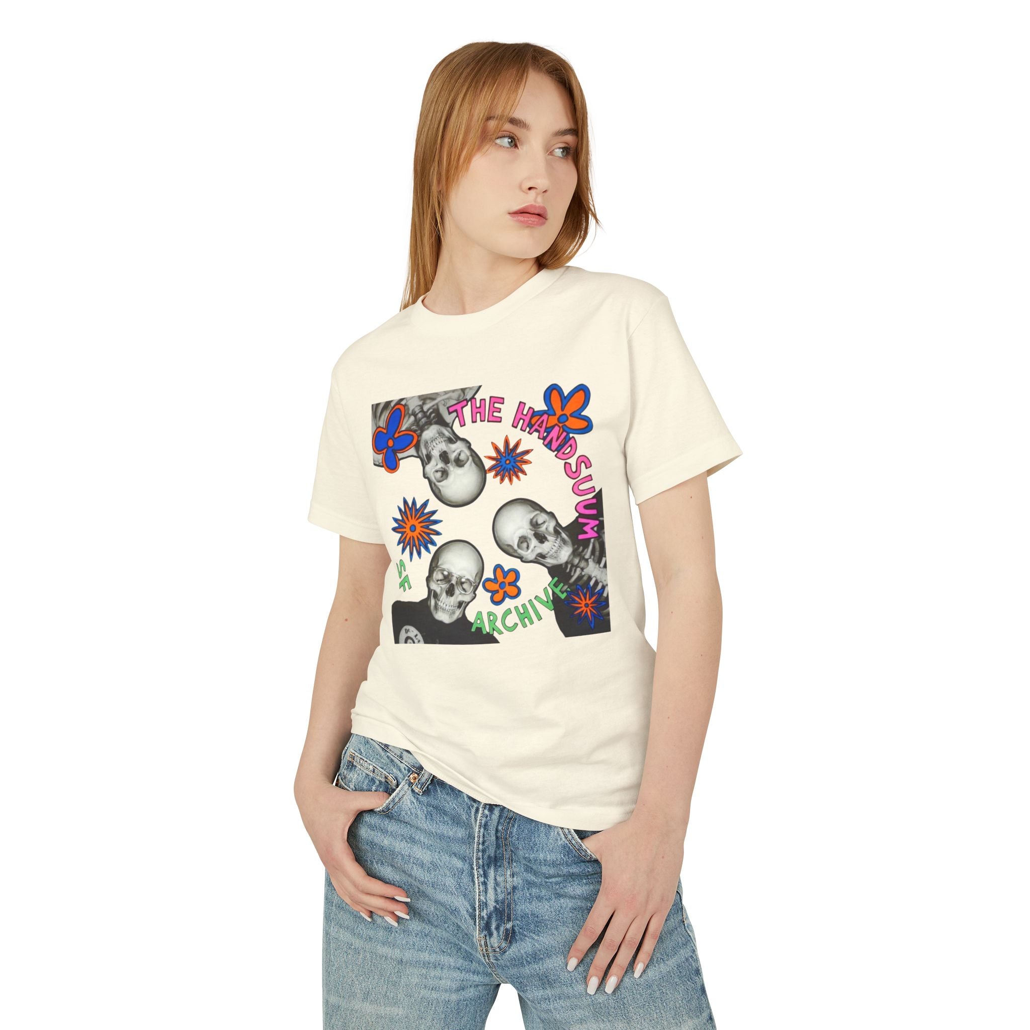 Cream graphic T-shirt front with skull collage and colorful "The Handsum Archiv" text
