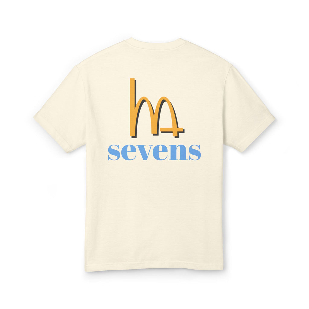 Cream crewneck T-shirt back with yellow “m4” and blue “sevens” text graphic