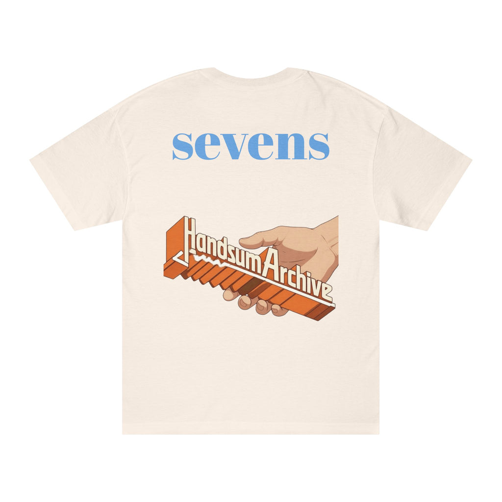 Light cream T-shirt with back print reading “sevens” and “landSumaArchiv” graphic