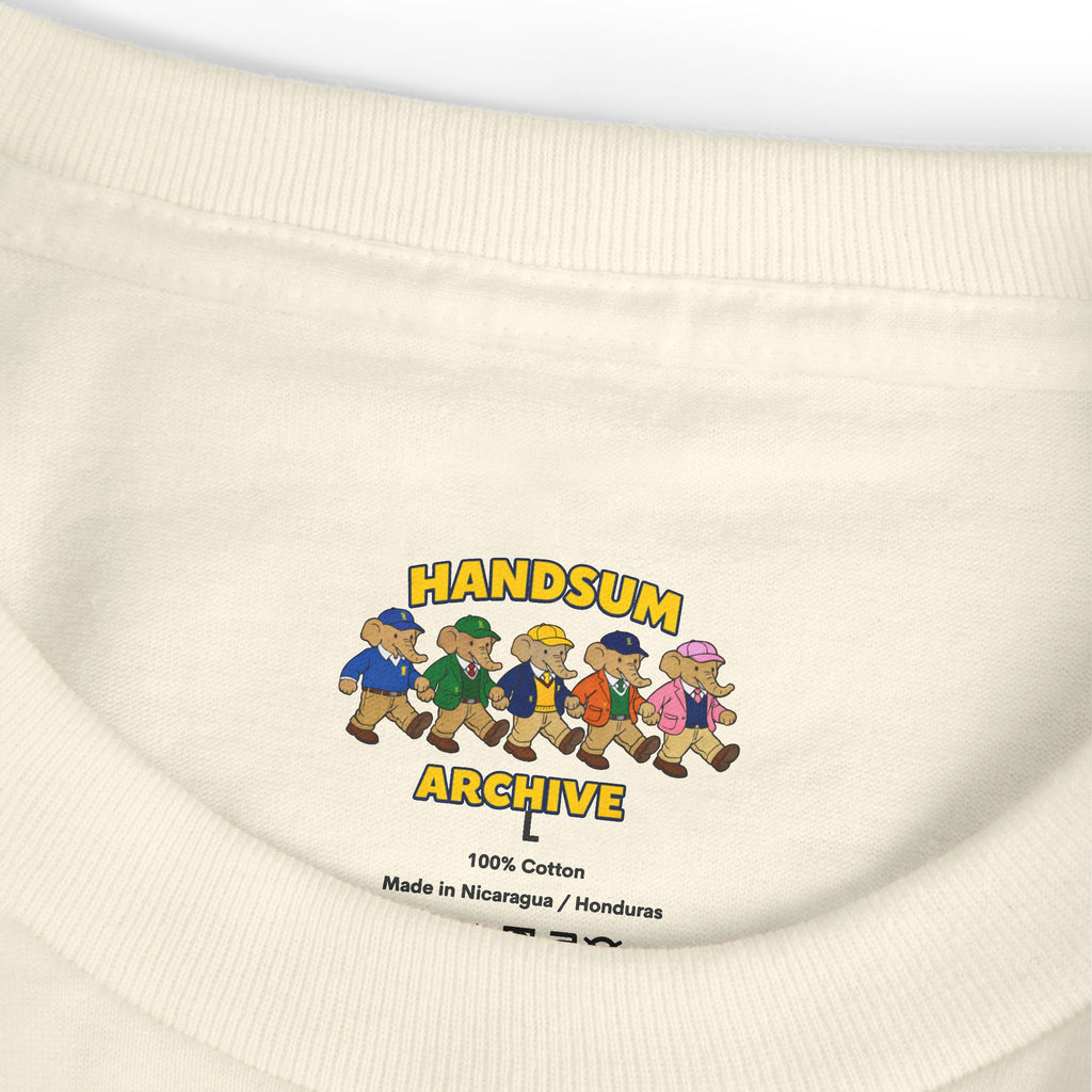 Off-white T-shirt neck label reading HANDSUM ARCHIVE, 100% cotton, made in Central America