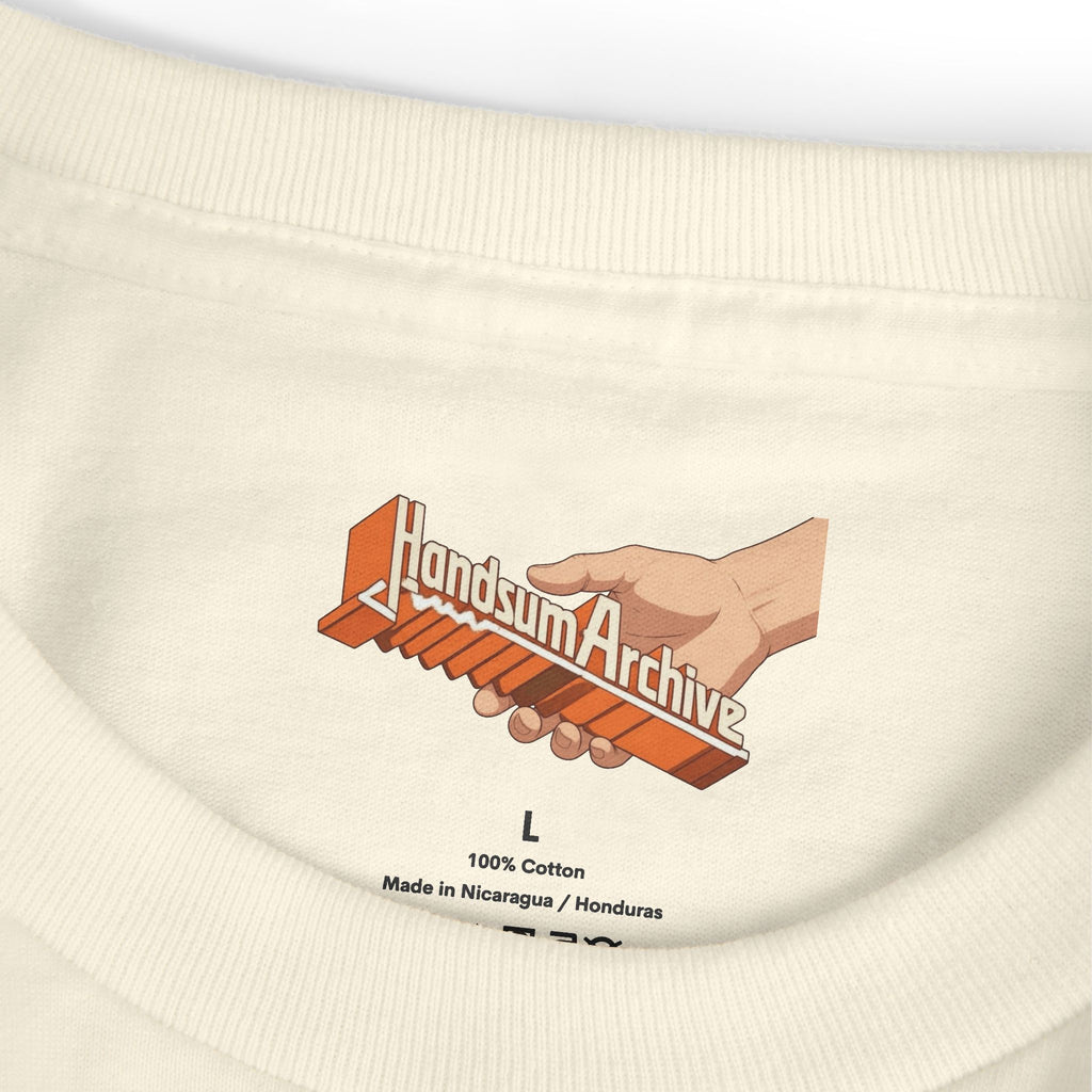 Cream Nothing Tee hem close-up with size L and fabric info label