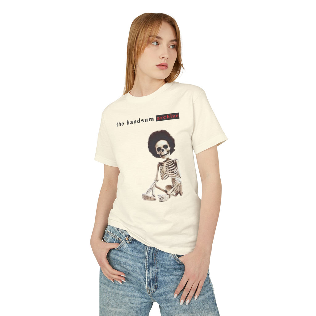 Warning Tee faded cream T-shirt with front skeleton graphic, worn by model