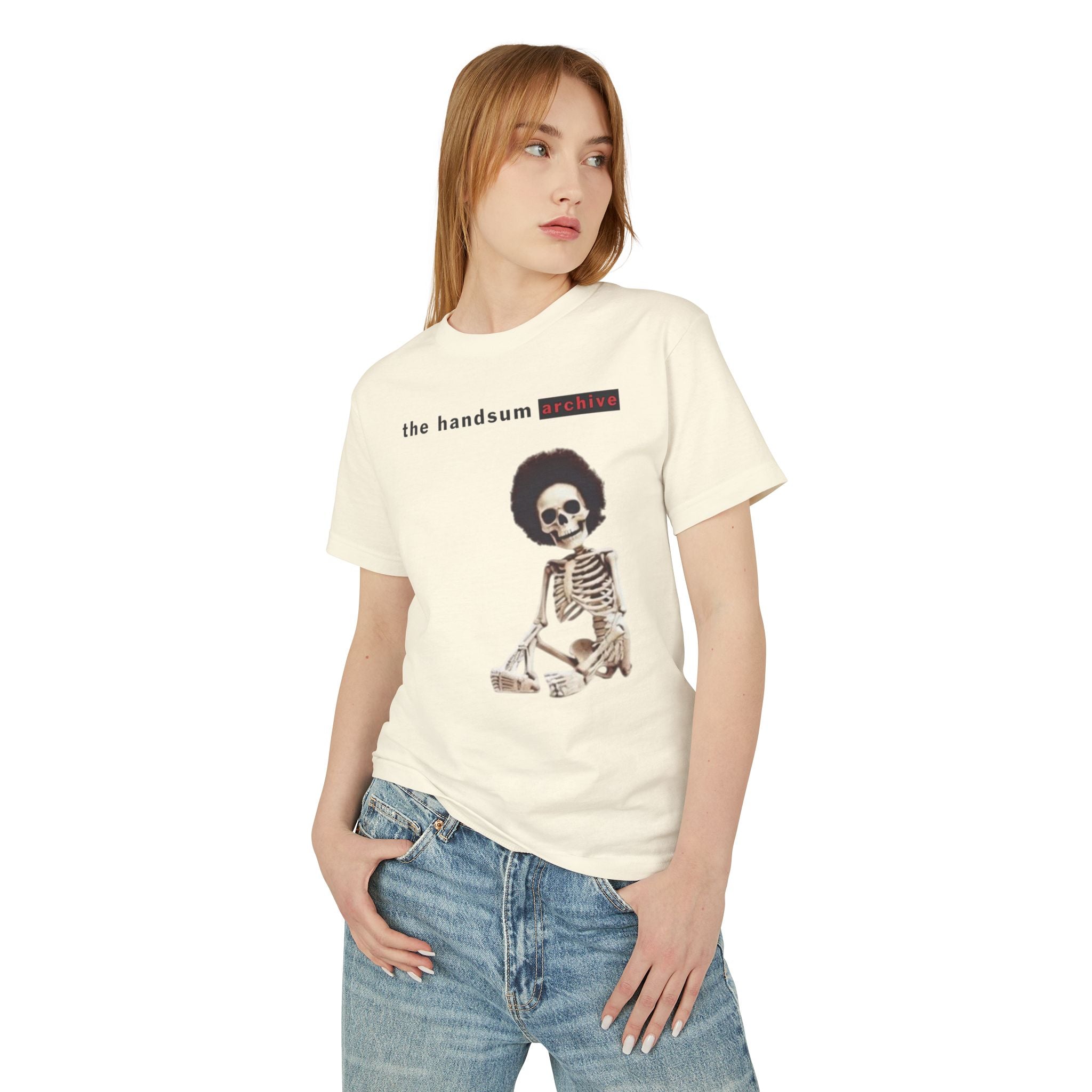 Warning Tee faded cream T-shirt with front skeleton graphic, worn by model