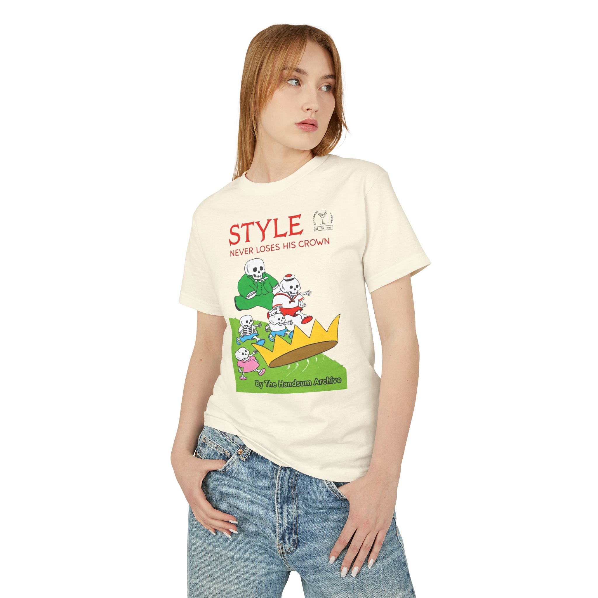 Faded cream T-shirt with front 'STYLE Never Loses His Crown' cartoon graphic, paired with jeans