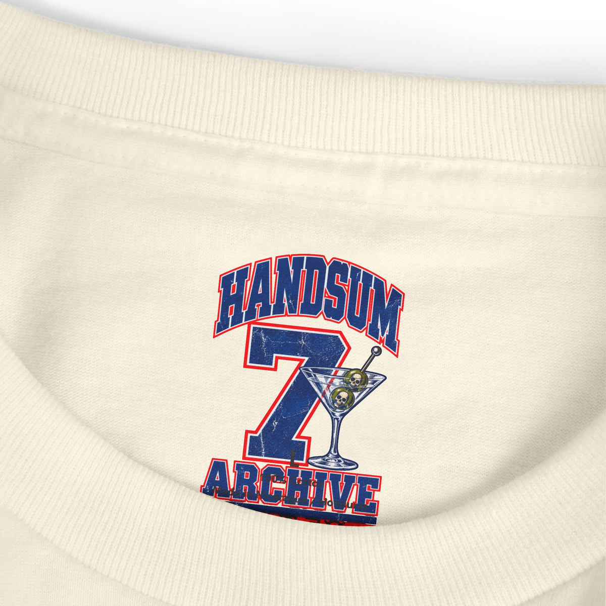 Cream graphic tee close-up of “HANDSUM ARCHIVE” chest logo