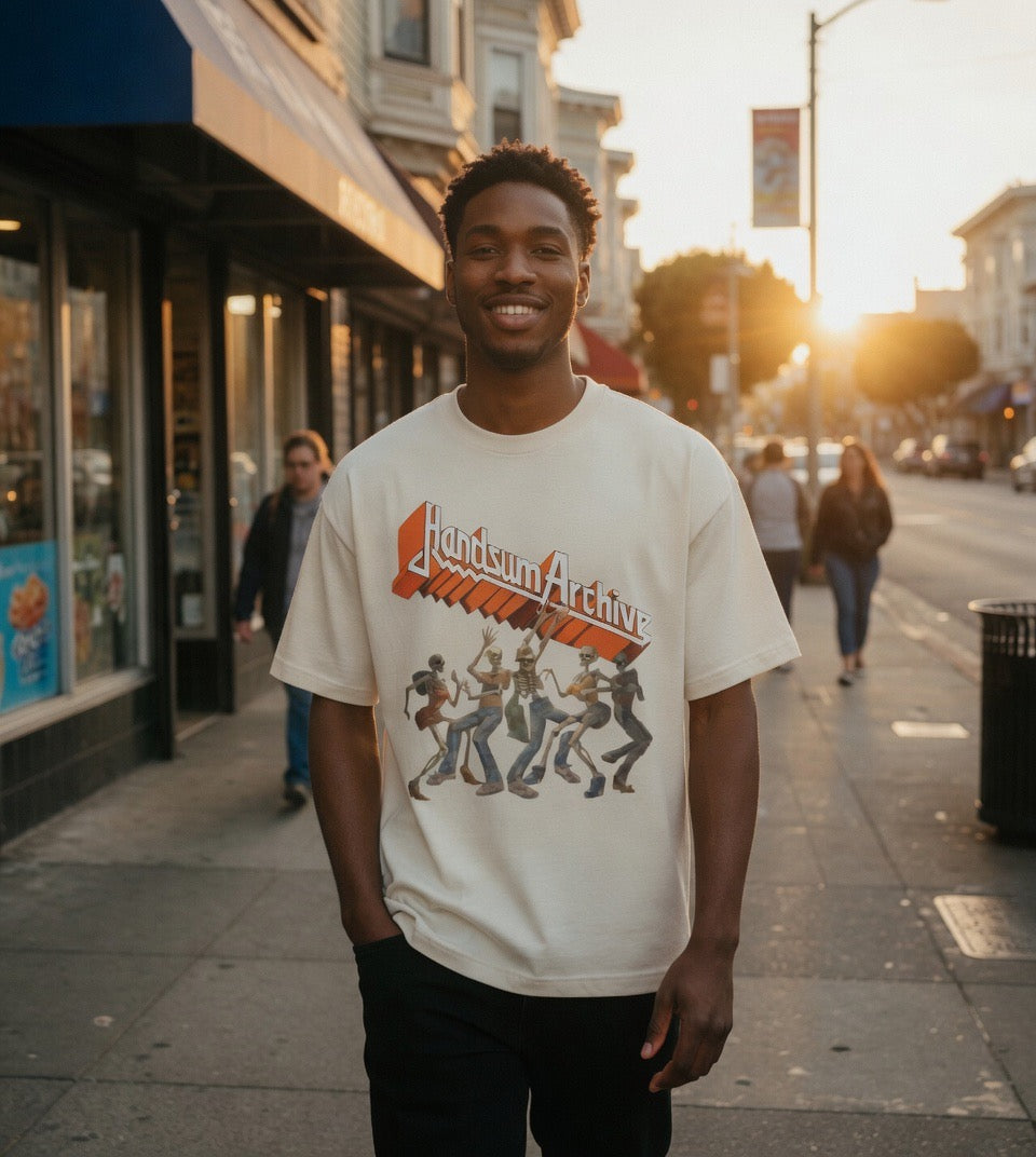 Faded cream graphic tee with front logo and character illustration