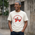 First in Flight tee, faded cream crewneck with red handsum avio cartoon print