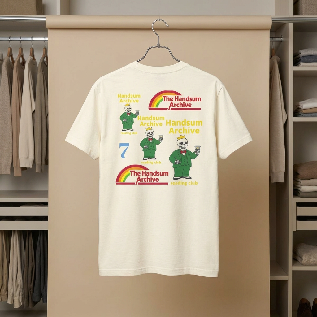 Faded cream T-shirt on hanger with large back 'The Handsum Archive' graphic