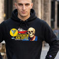 Black pullover hoodie with skull graphic front, kangaroo pocket, drawstring hood