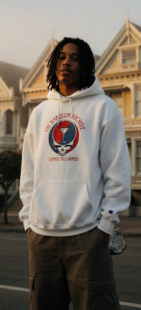 White hoodie with front hood, kangaroo pocket, and red/blue graphic chest print