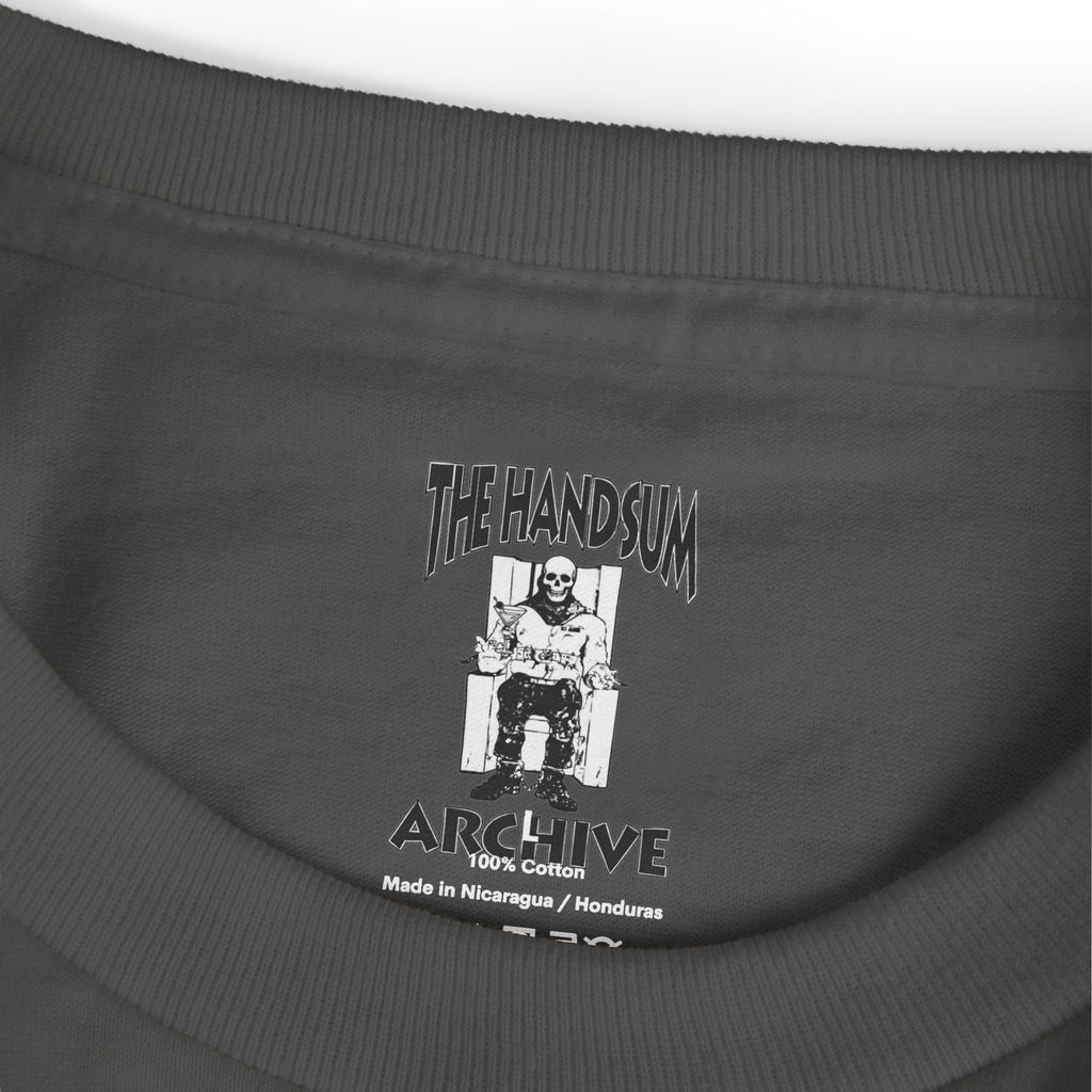 Dark T-shirt inner hem label reading Handsum Archive and 100% cotton