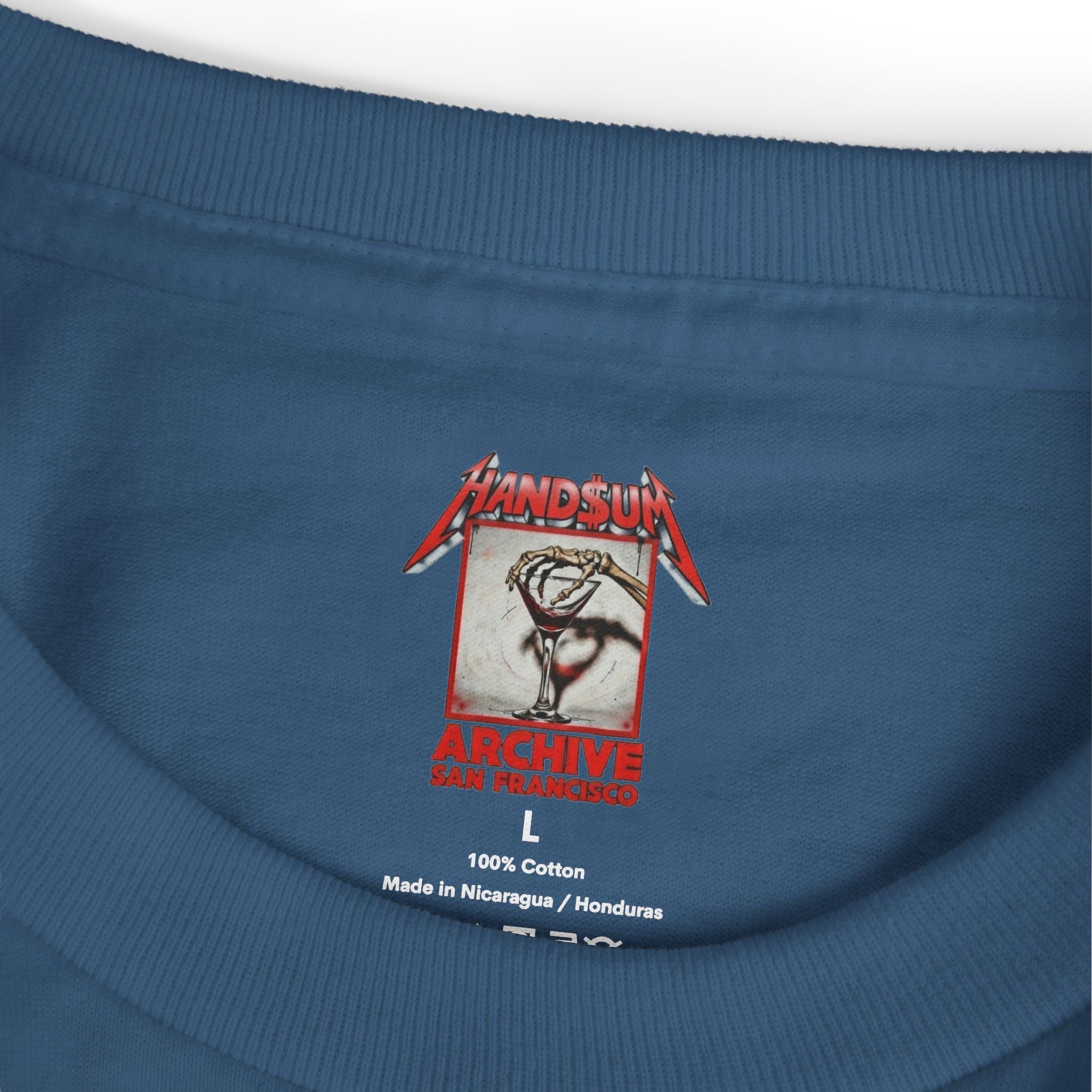 Blue crewneck tee close-up of neck label and Handsum Archive graphic