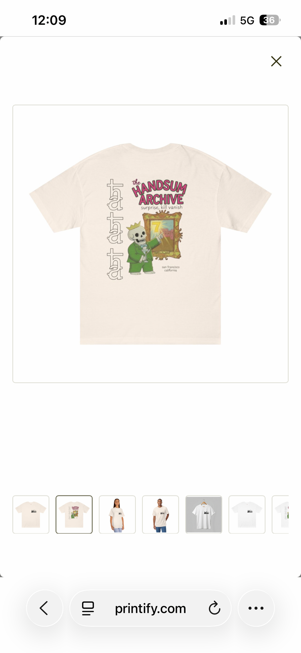 Beige graphic tee shirt with front illustration and 'The HANDSUM ARCHIVE' text