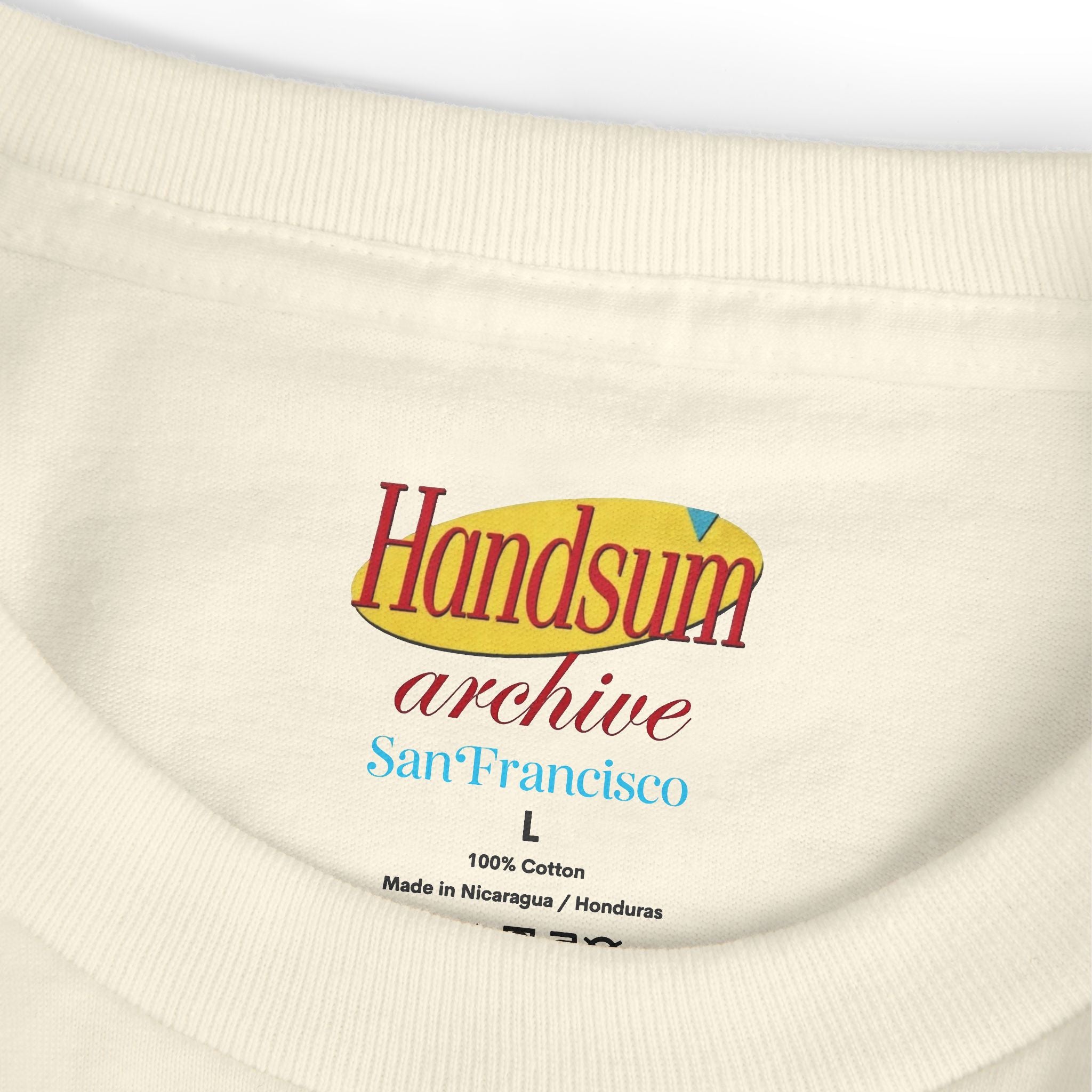Faded cream T-shirt neckline label with Handsum archive San Francisco text