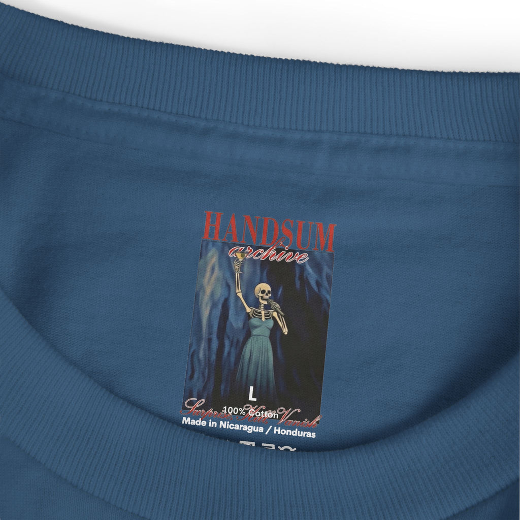Blue T-shirt neck label showing “HANDSUN archive,” size L, and “Made in Nicaragua”