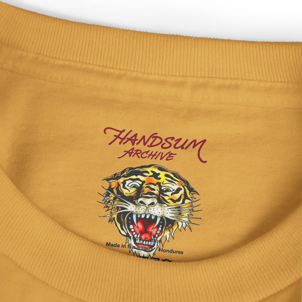 Mustard T-shirt with tiger head graphic and Handsum Archive logo on the chest
