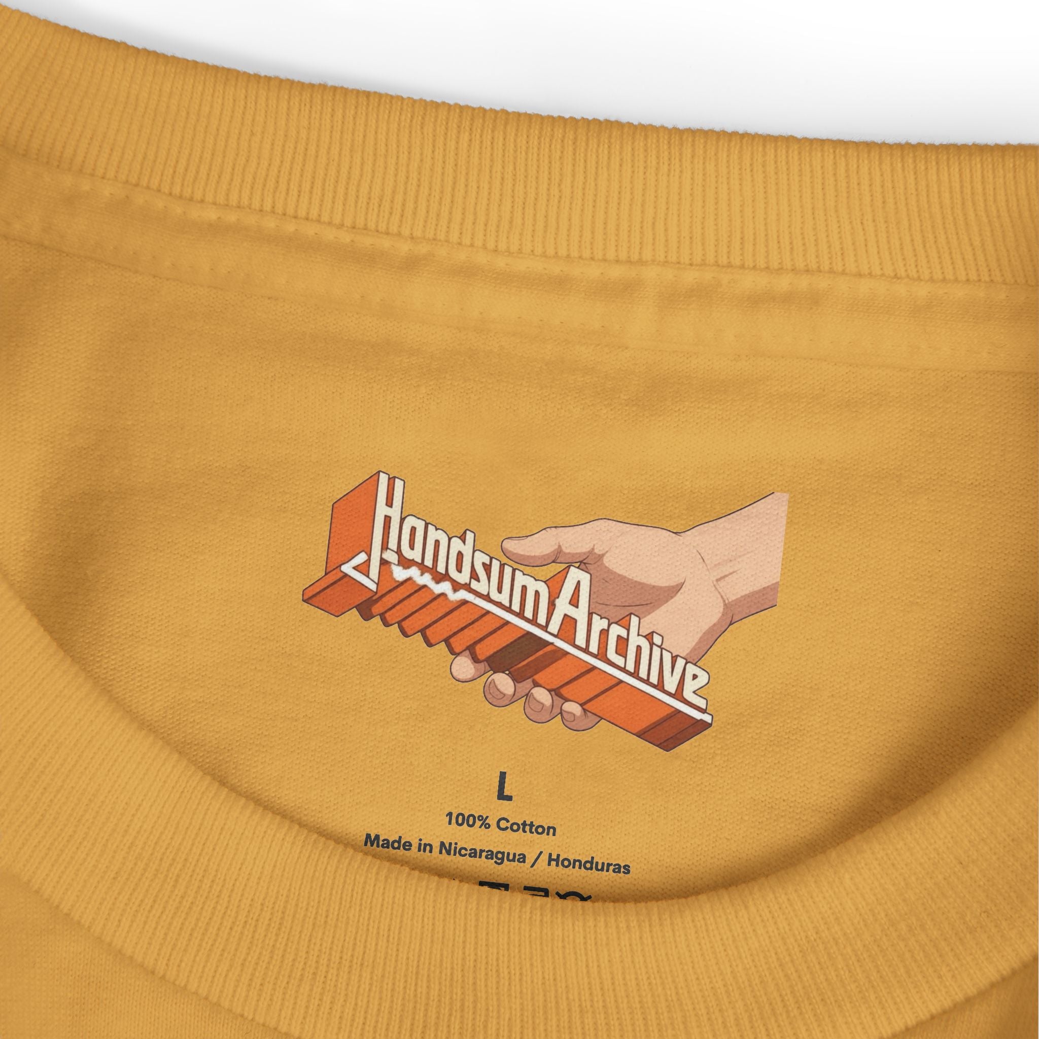 Cotton T-shirt neckline close-up with size L label and 'Handsum Archive' graphic