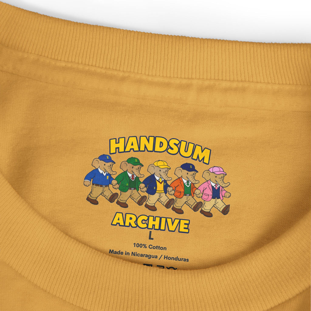 Mustard T-shirt neckline close-up with “HANDSUN ARCHIVE L” and cotton text