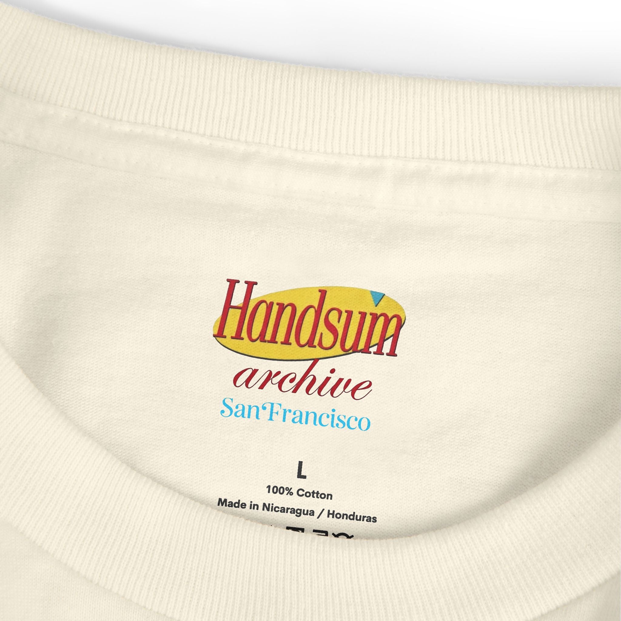 Cream T-shirt crew-neck closeup; 'Handsnum Archive' size L label