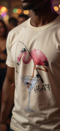 White T-shirt with pink flamingo graphic drinking from a martini glass.