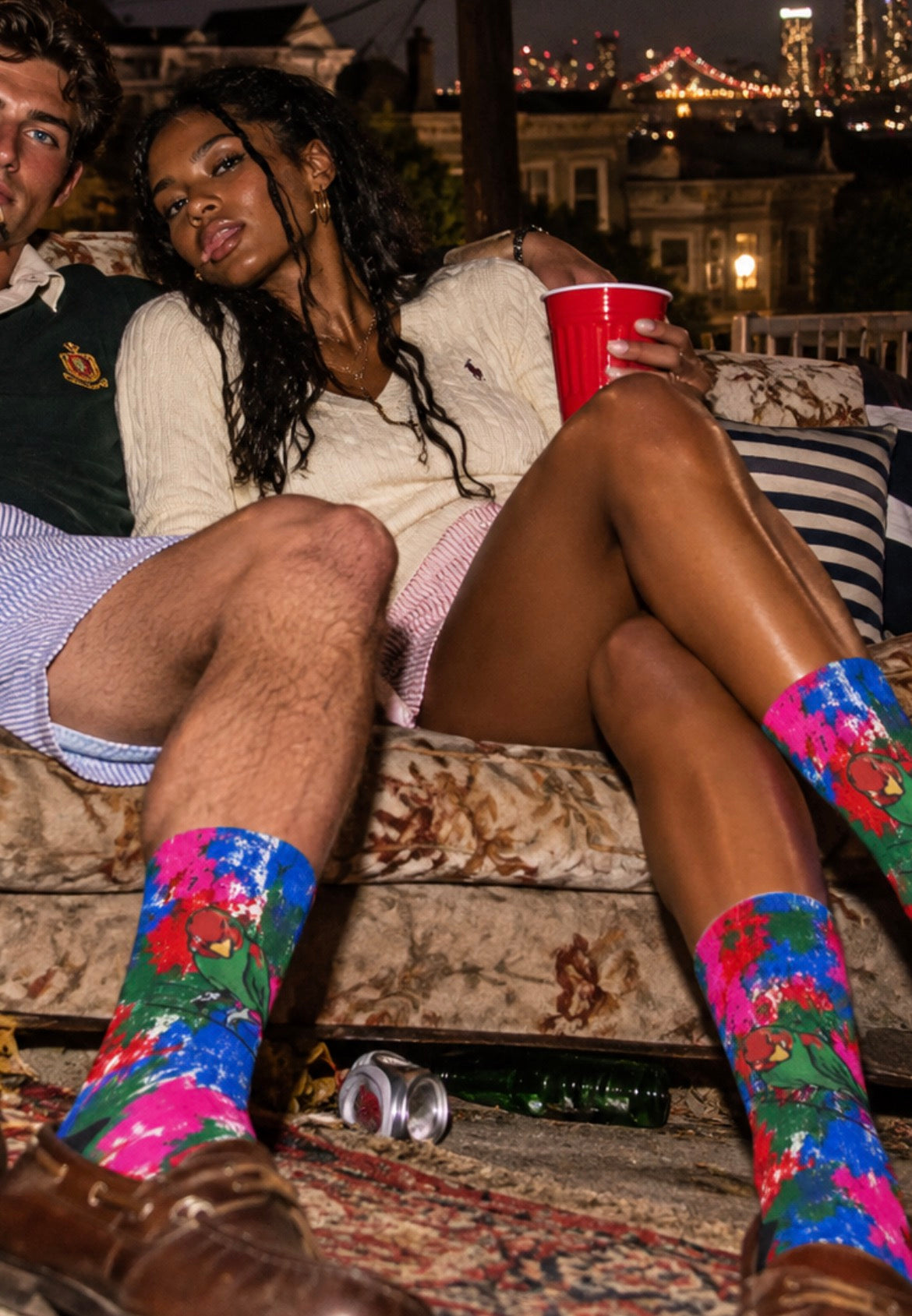 Crew socks with bright tropical bird floral pattern, black toe and heel sections