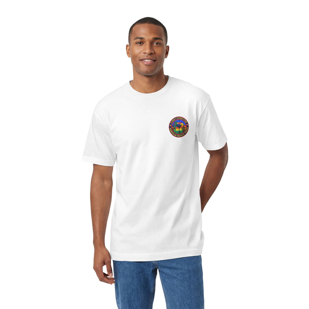 White crewneck tee with small round chest logo patch