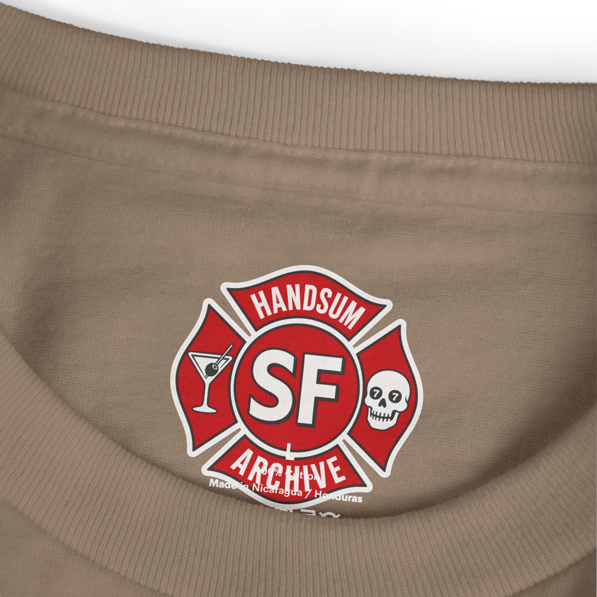 Faded brown tee close-up of red Handsum SF Archive chest logo
