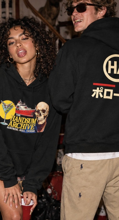 Black graphic hoodie with skull print and Japanese back logo