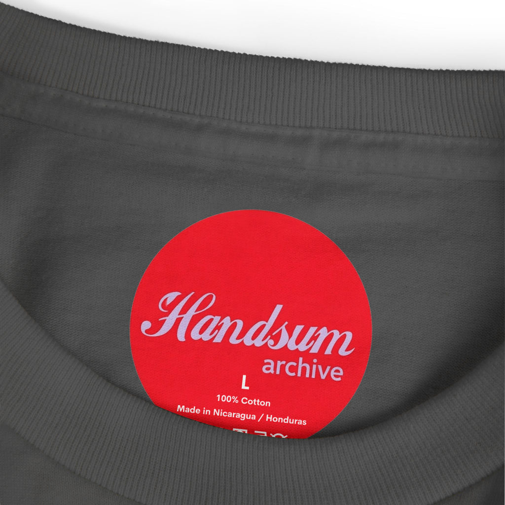 Dark t-shirt neck label with red "Handsumn archive" logo patch