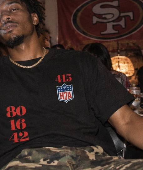 Black graphic T-shirt with red HZA 415 and stacked 80 16 42 print
