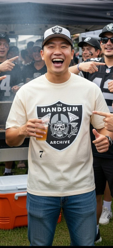 Faded cream crewneck T-shirt with large “Hands um Archive” logo graphic on chest