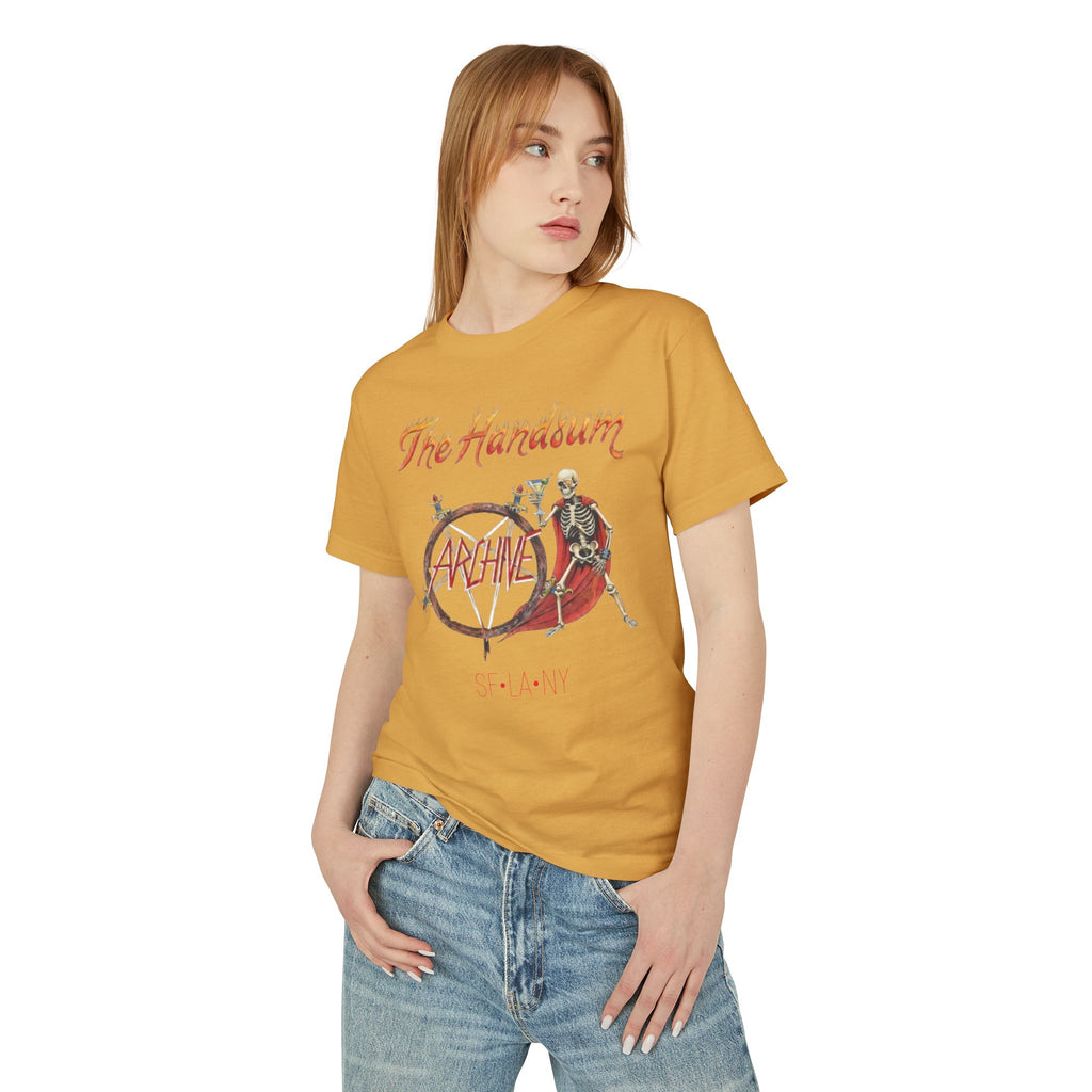 Gold-brown Slayer Generational tee with front “ARCHIVE” circular skeleton graphic.