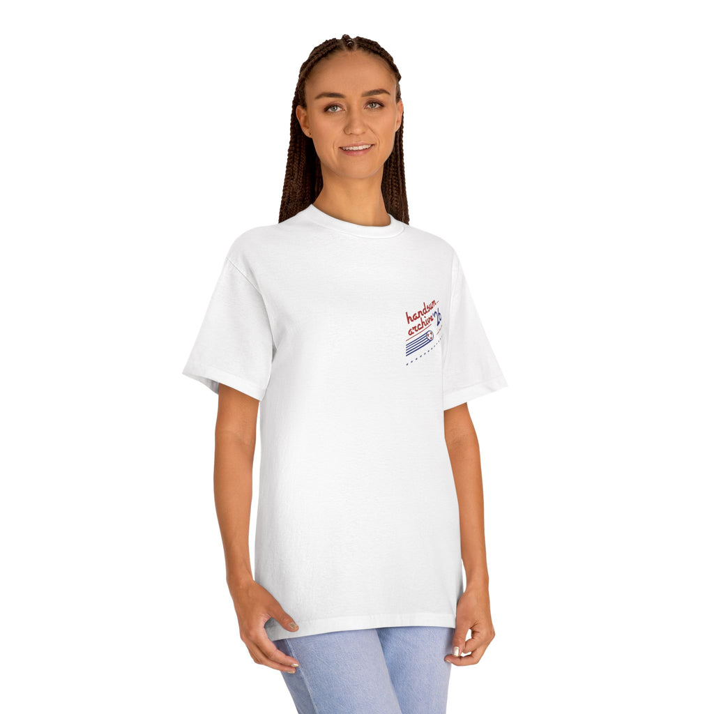 White short-sleeve tee with small chest graphic, worn by a model