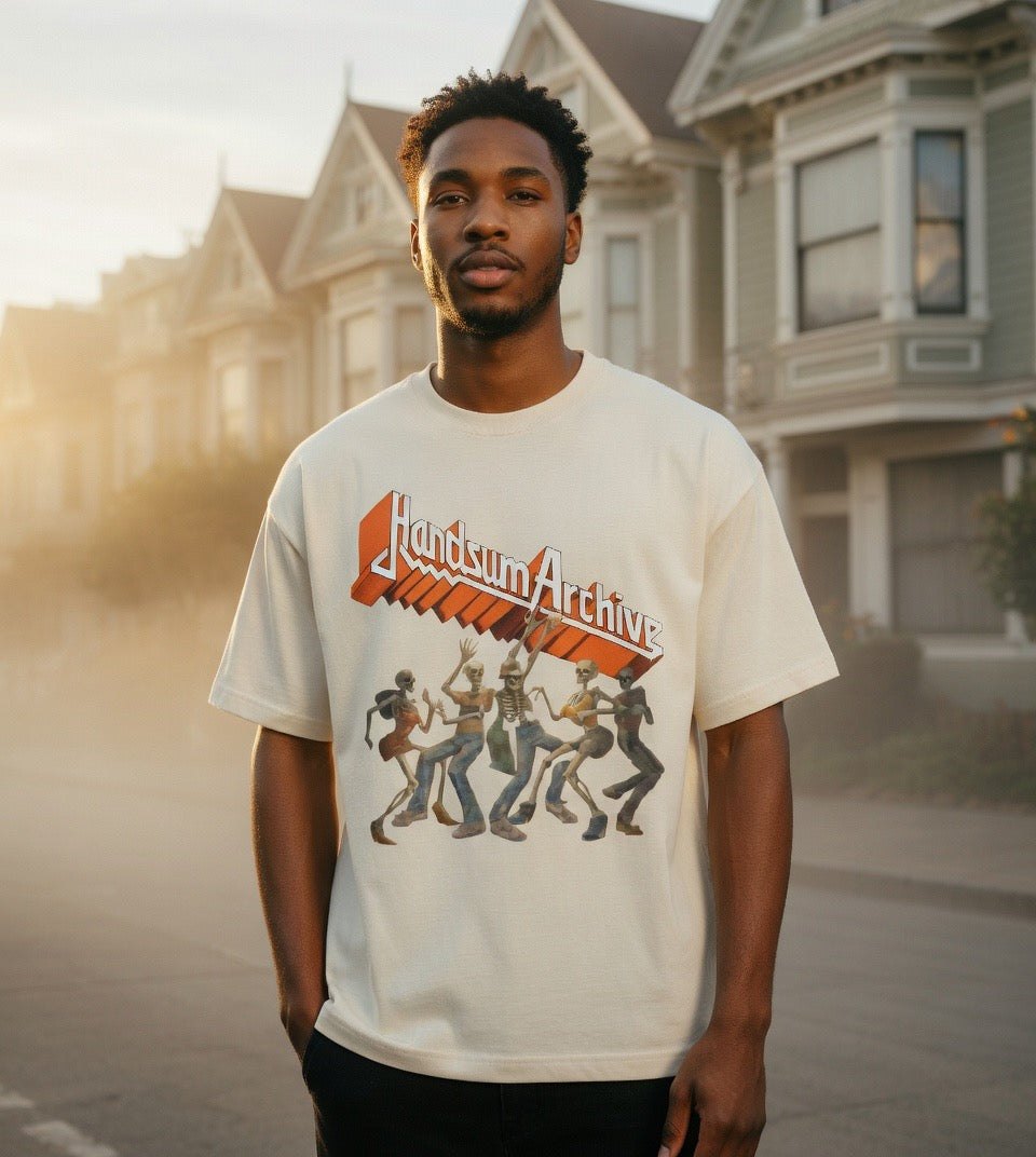Faded cream graphic tee with front logo and character group graphic