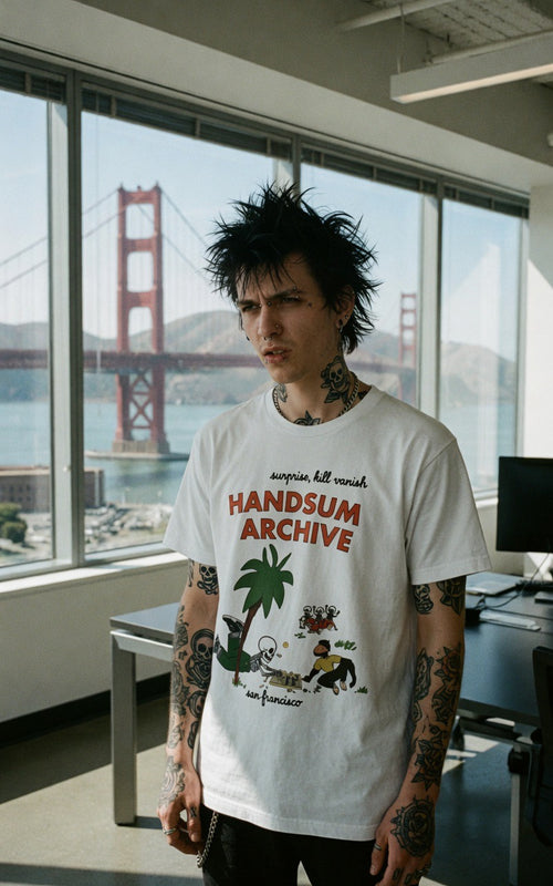White moisture-wicking tee with front 'HANDSUN ARCHIVE' graphic and crew neck.